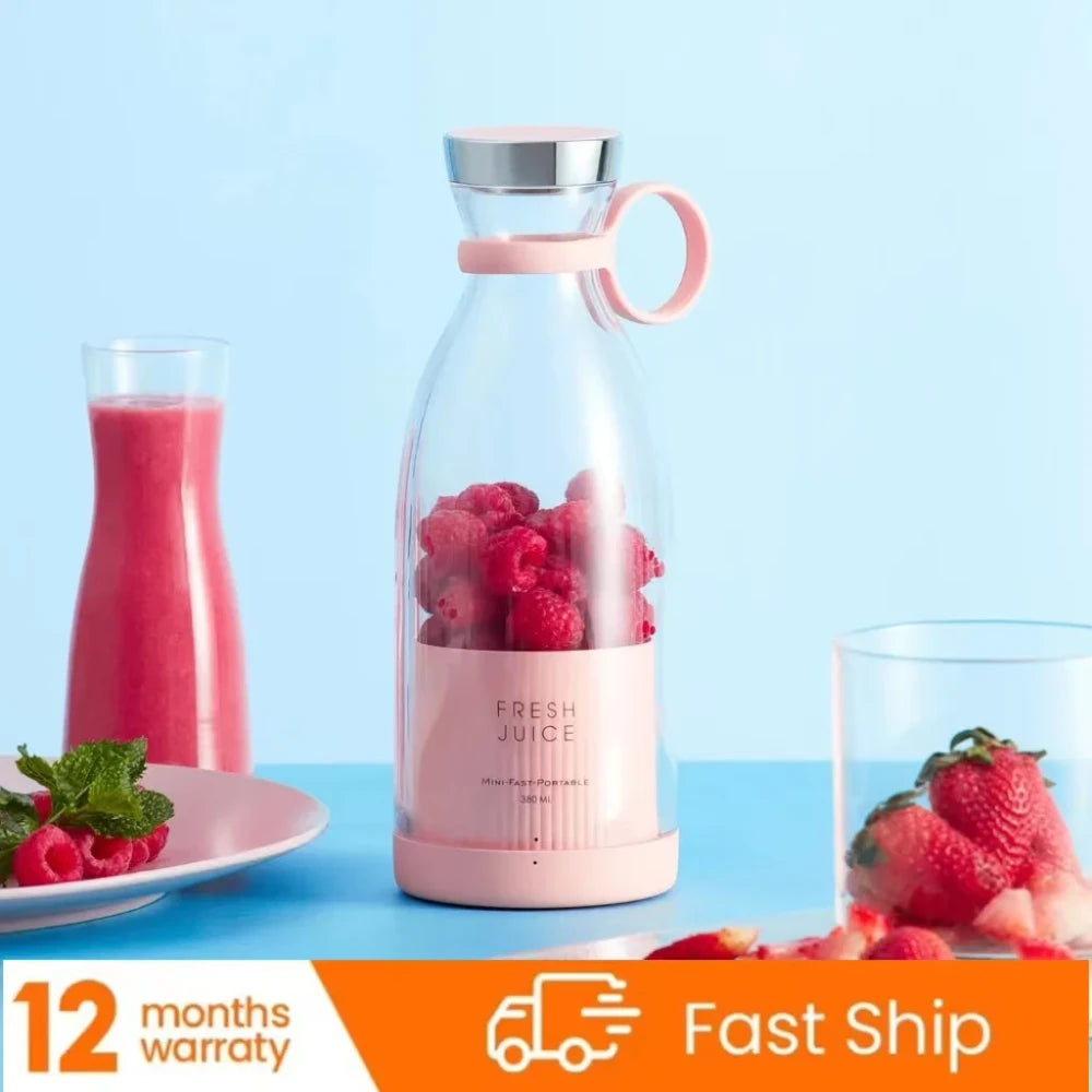 Pink juice blender with raspberries, pink smoothie, and strawberries on a blue background