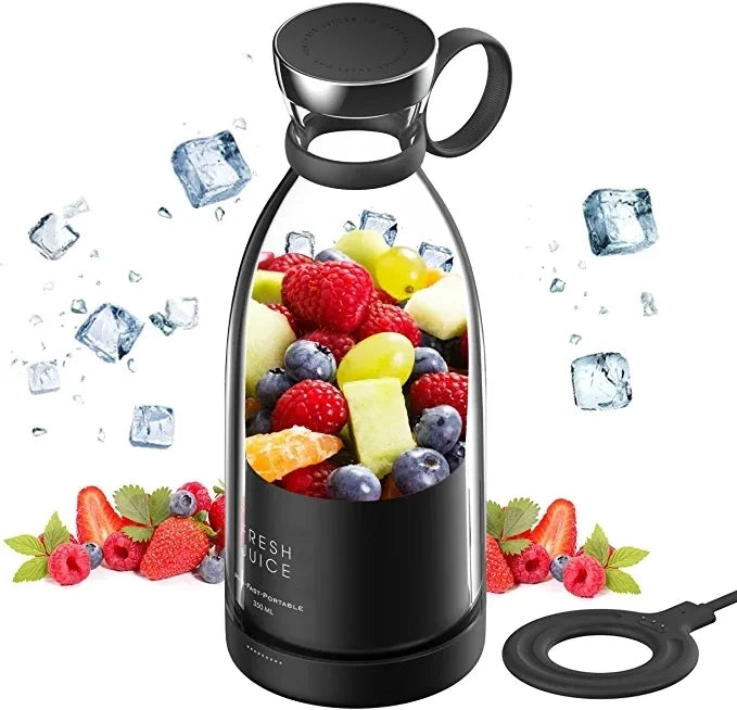 Black Fresh Juice portable blender filled with mixed berries and ice cubes – lifestyle product shot with magnetic charging ring