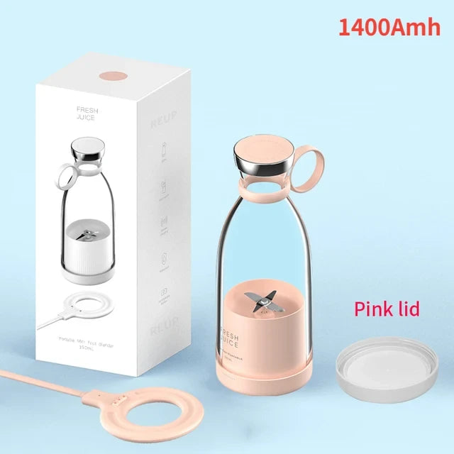 Pink Fresh Juice portable blender with 1400mAh battery shown with packaging, pink lid, and magnetic charging cable