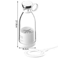 White portable juicer with dimensions indicated on a white background