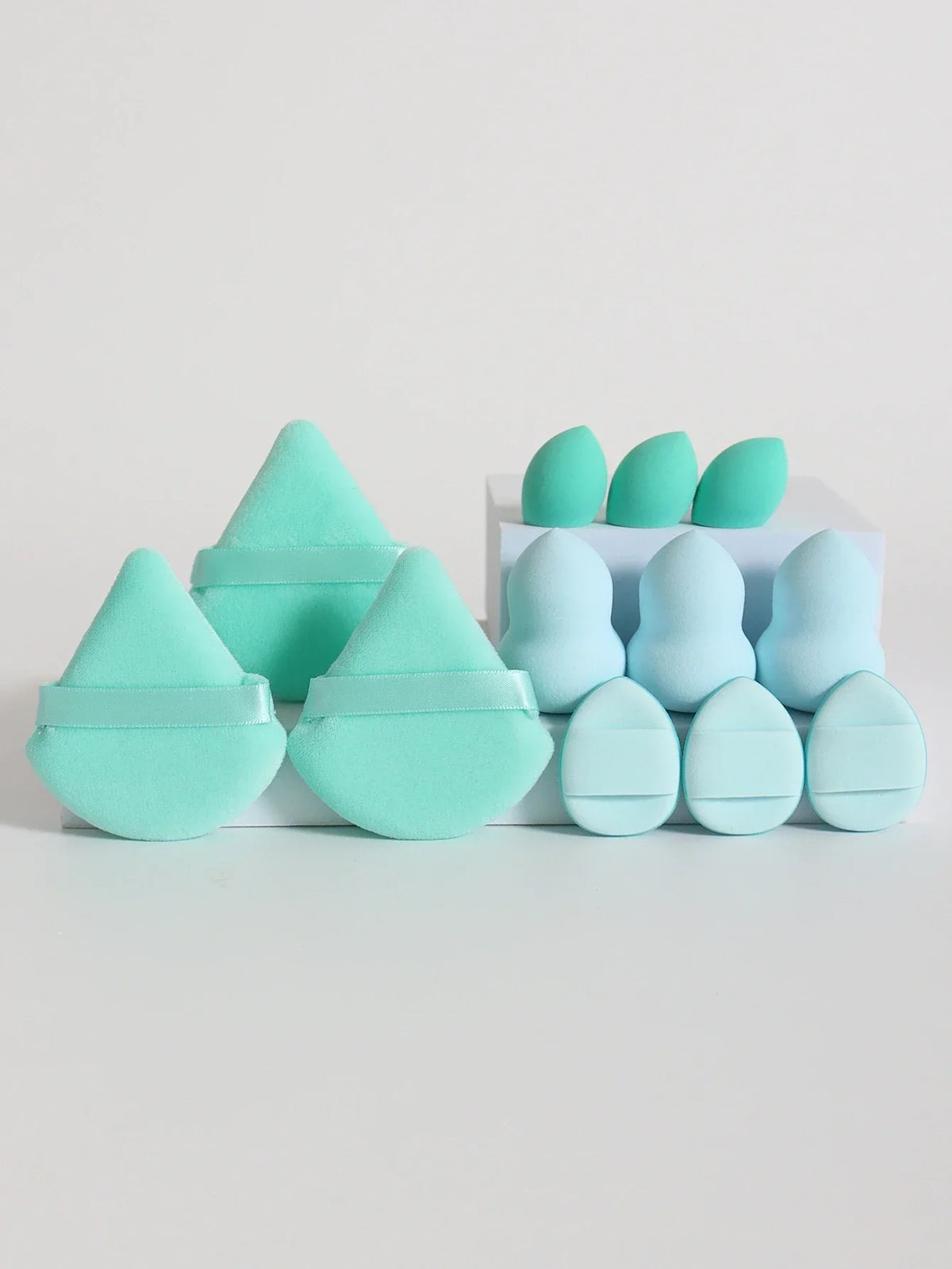 12-piece makeup sponge set with powder puffs blending sponges and beauty eggs in turquoise