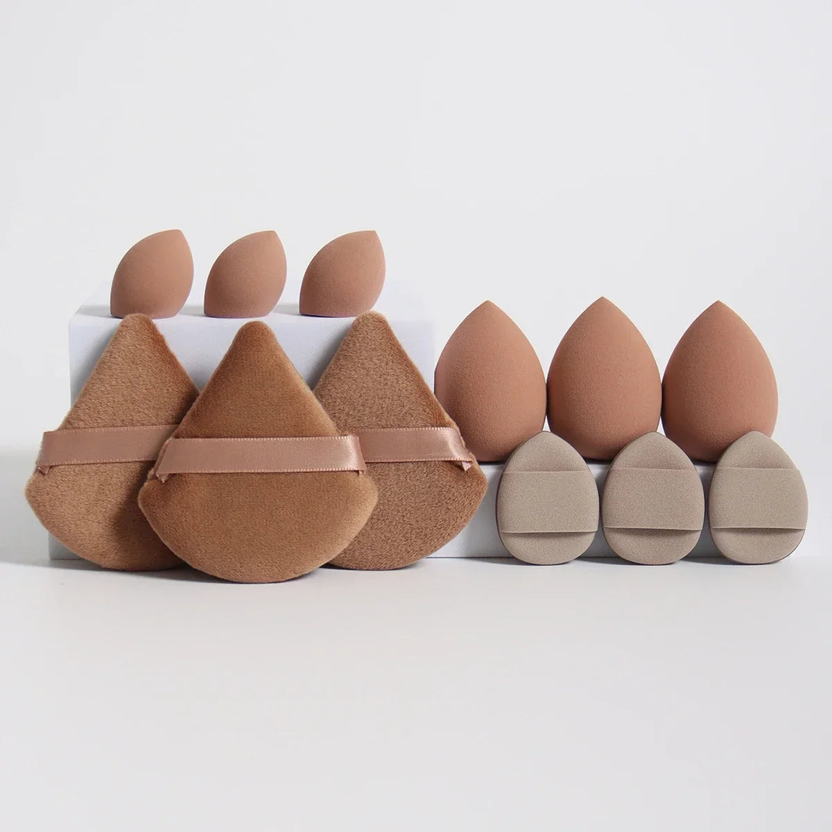 12-piece makeup sponge set with powder puffs blending sponges and beauty eggs in brown