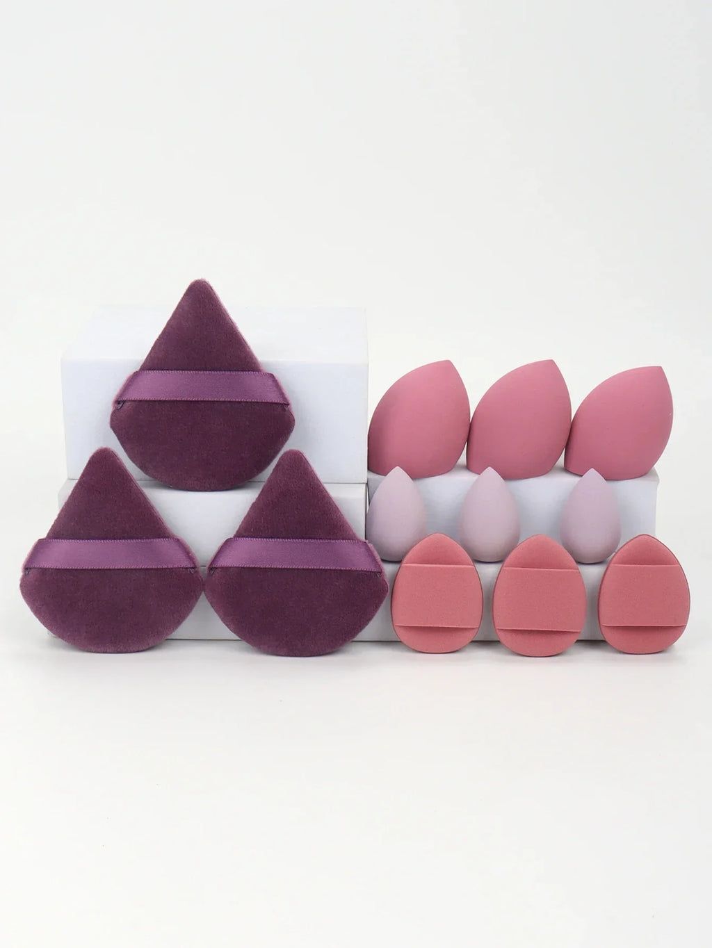 12-piece makeup sponge set with powder puffs blending sponges and beauty eggs in purple and pink