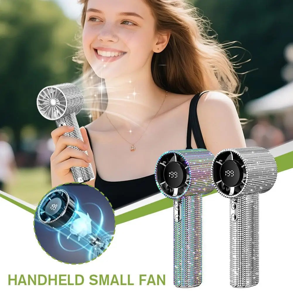 Woman holding diamond rhinestone handheld mini fan outdoors – silver and rainbow color options shown