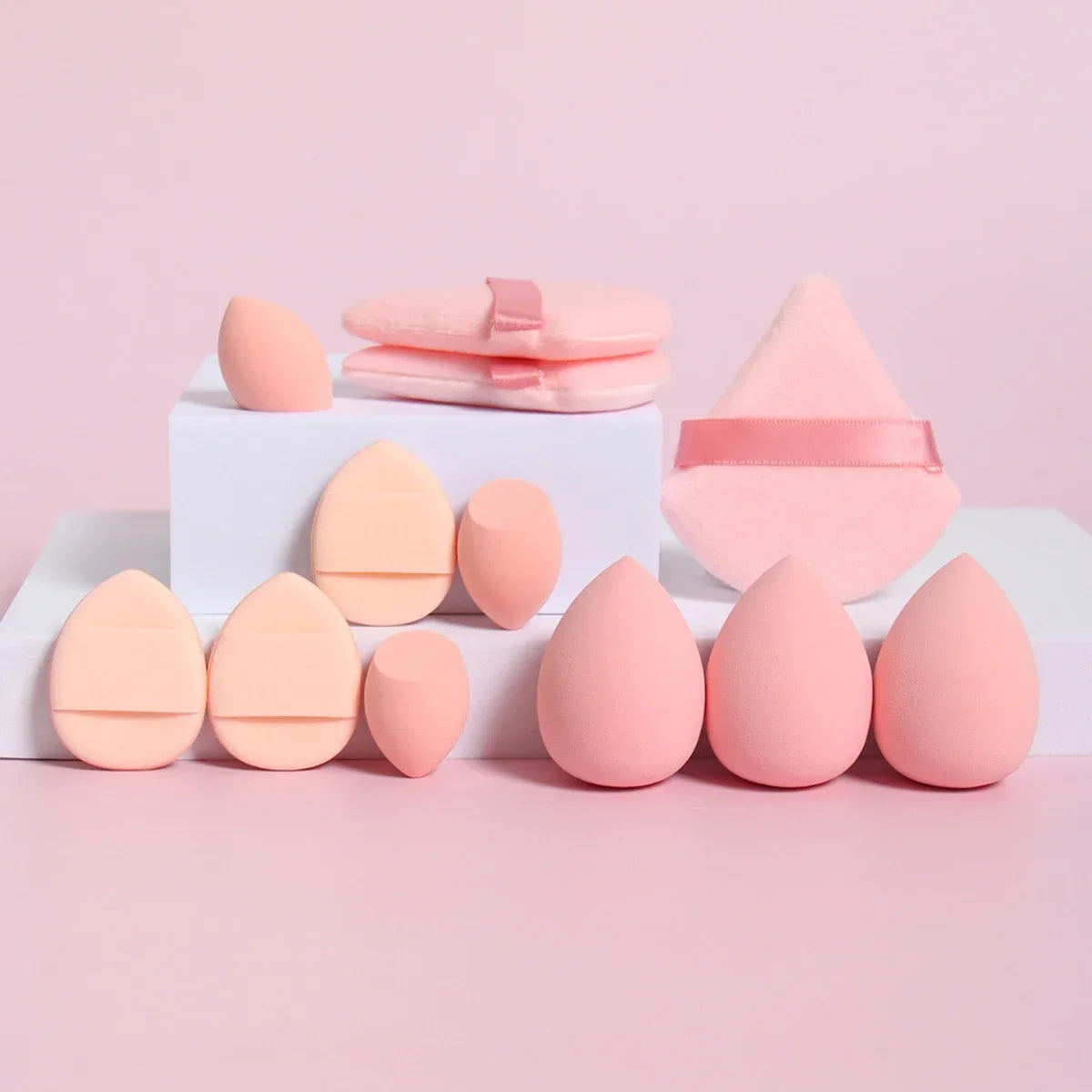 12-piece makeup sponge set with powder puffs blending sponges and beauty eggs in pink