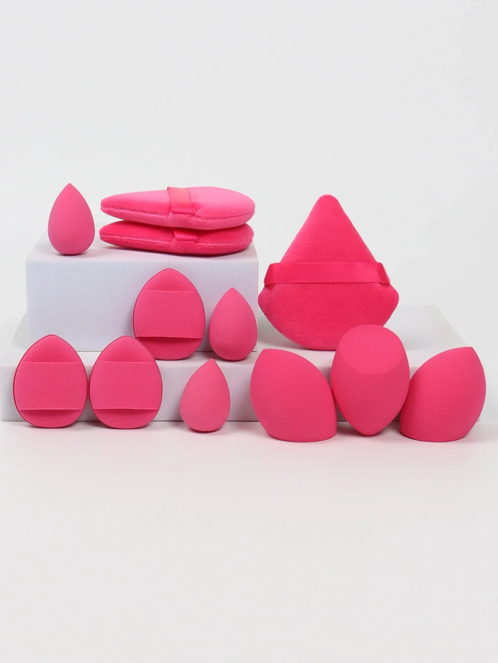 12-piece makeup sponge set with powder puffs blending sponges and beauty eggs in red